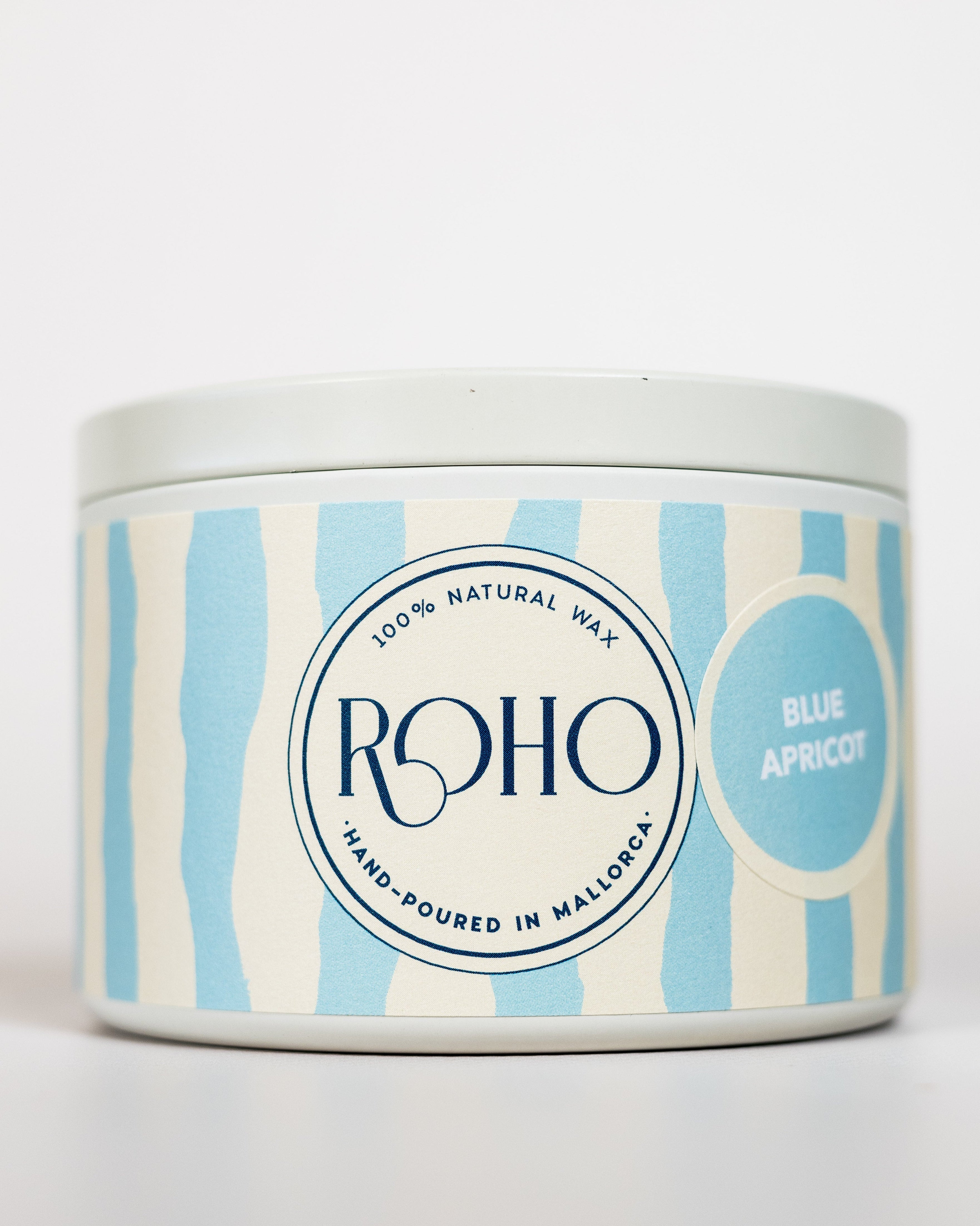 Candle tin with blue and white striped design and &