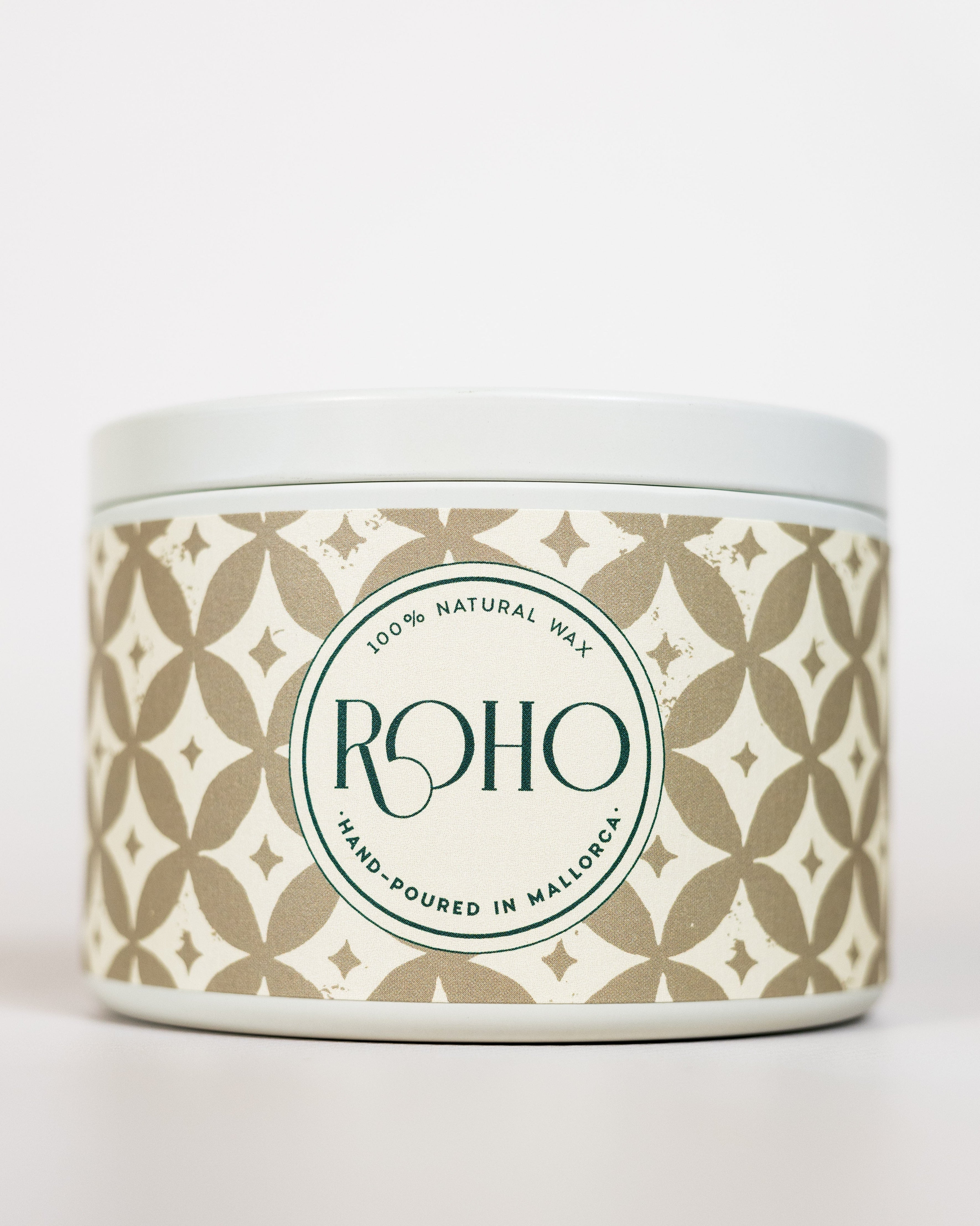 Scented Candle with a decorative patterned beige label on a white background. Winter Candle, Golden Myrrh scent, Christmas, gift, Winter candle