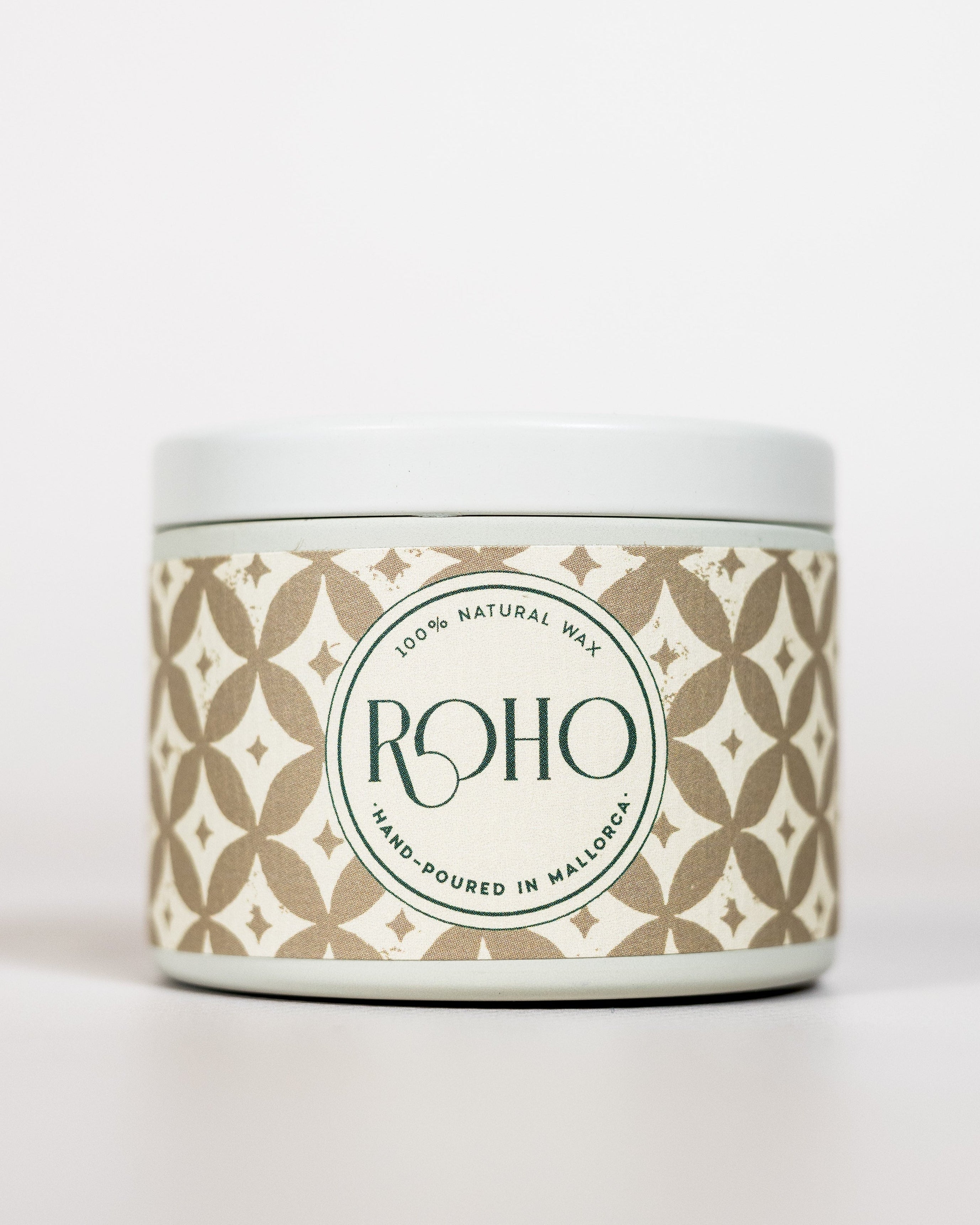 Scented Candle with a decorative patterned label on a white background. Winter Candle, Myrrh scent