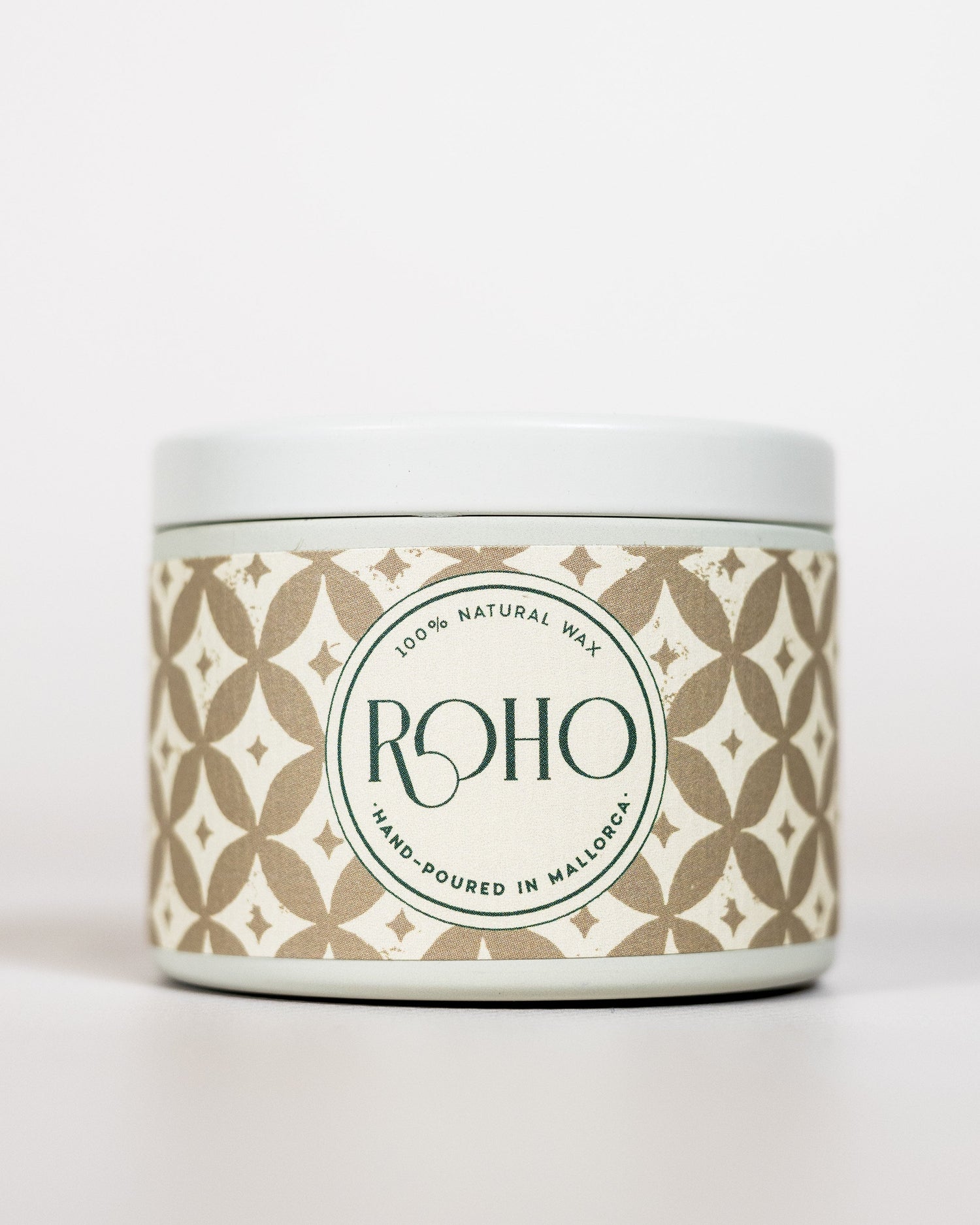 Scented Candle with a decorative patterned label on a white background. Winter Candle, Myrrh scent