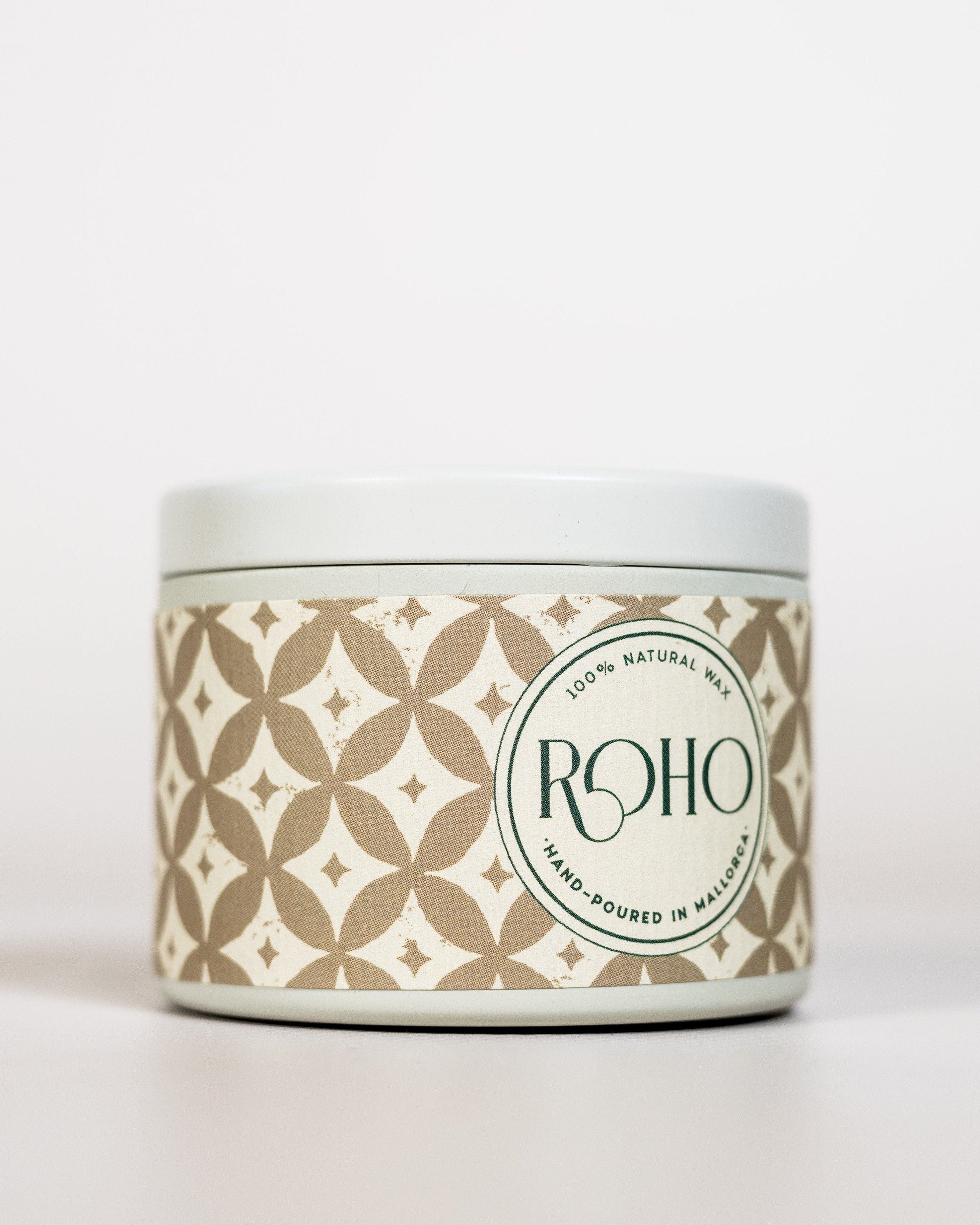 Scented Candle with a decorative beige patterned label on a white background. Winter Candle, Golden Myrrh scent, Christmas, gift, Winter candle