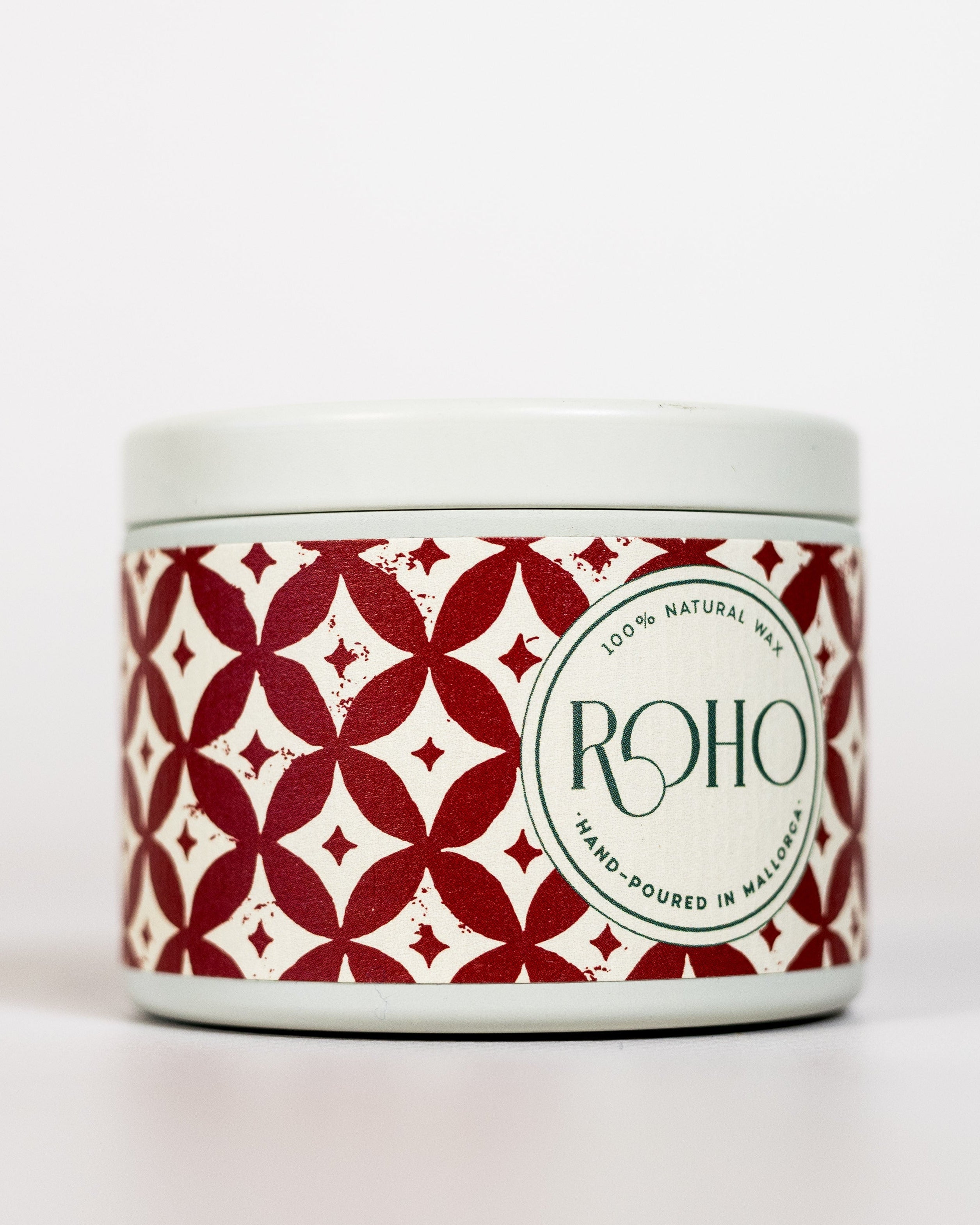 Scented Candle with red and white pattern label and &