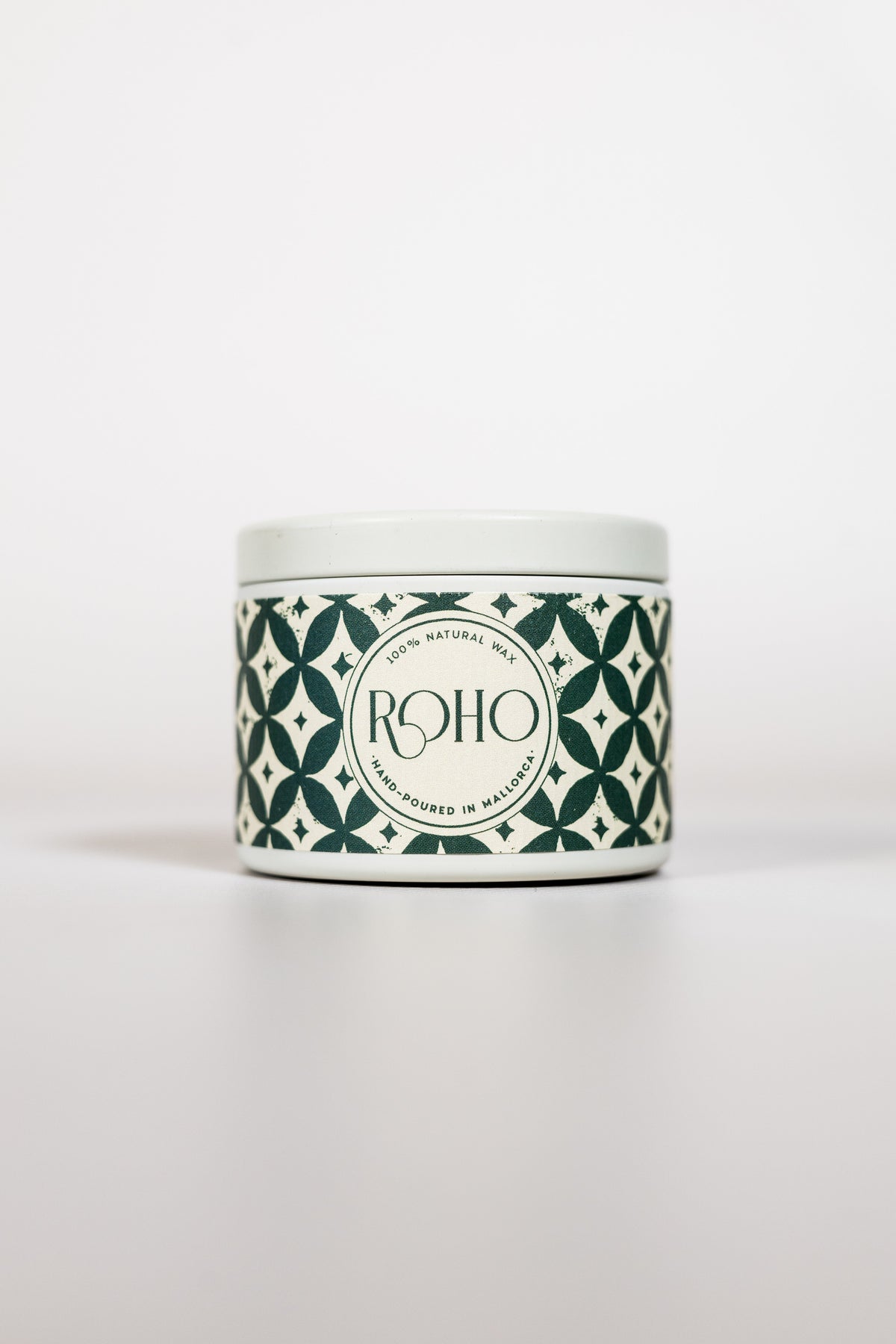Orange &amp; Cinnamon 90g scented candle in winter edition tin with green pattern