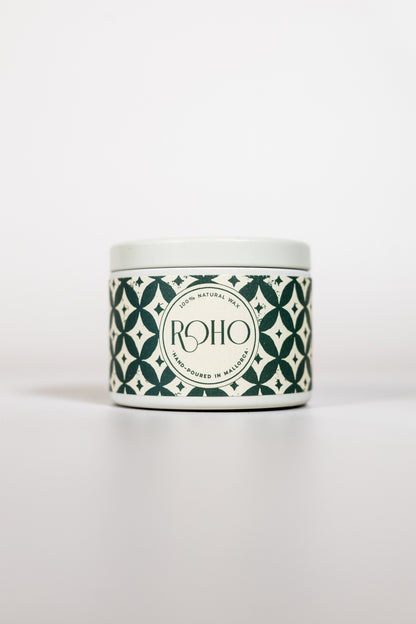 Orange &amp; Cinnamon 90g scented candle in winter edition tin with green pattern