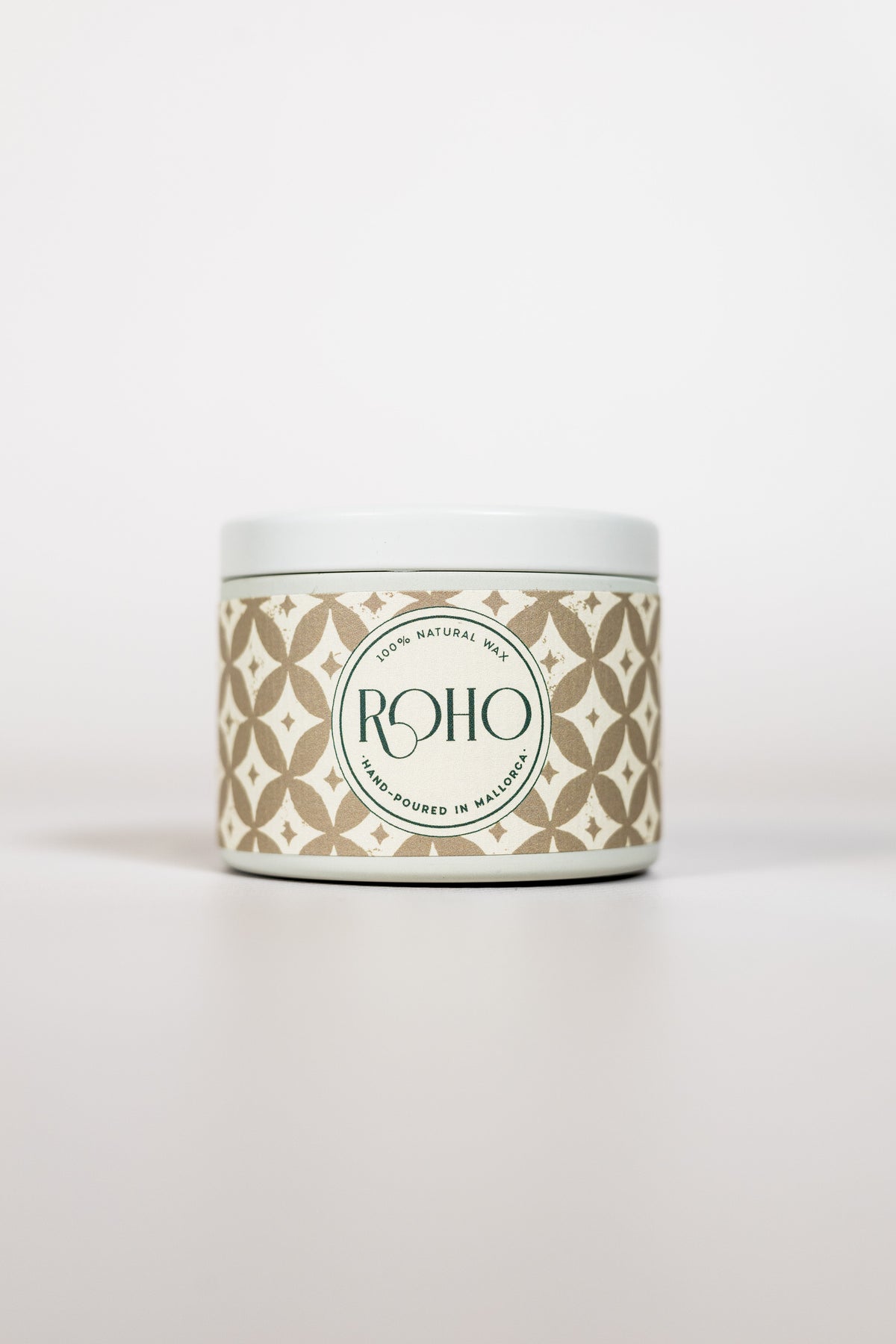 Golden Myrrh 90g scented candle in winter edition tin with beige pattern